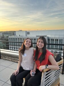 Two female students on the roof of the Dentons office.